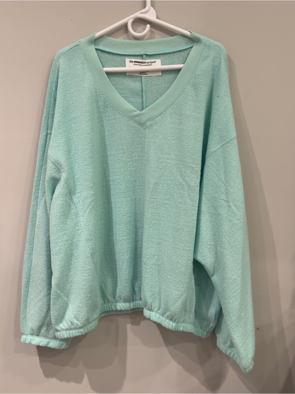 Relaxed Mint V-Neck Sweater by the newbritish project